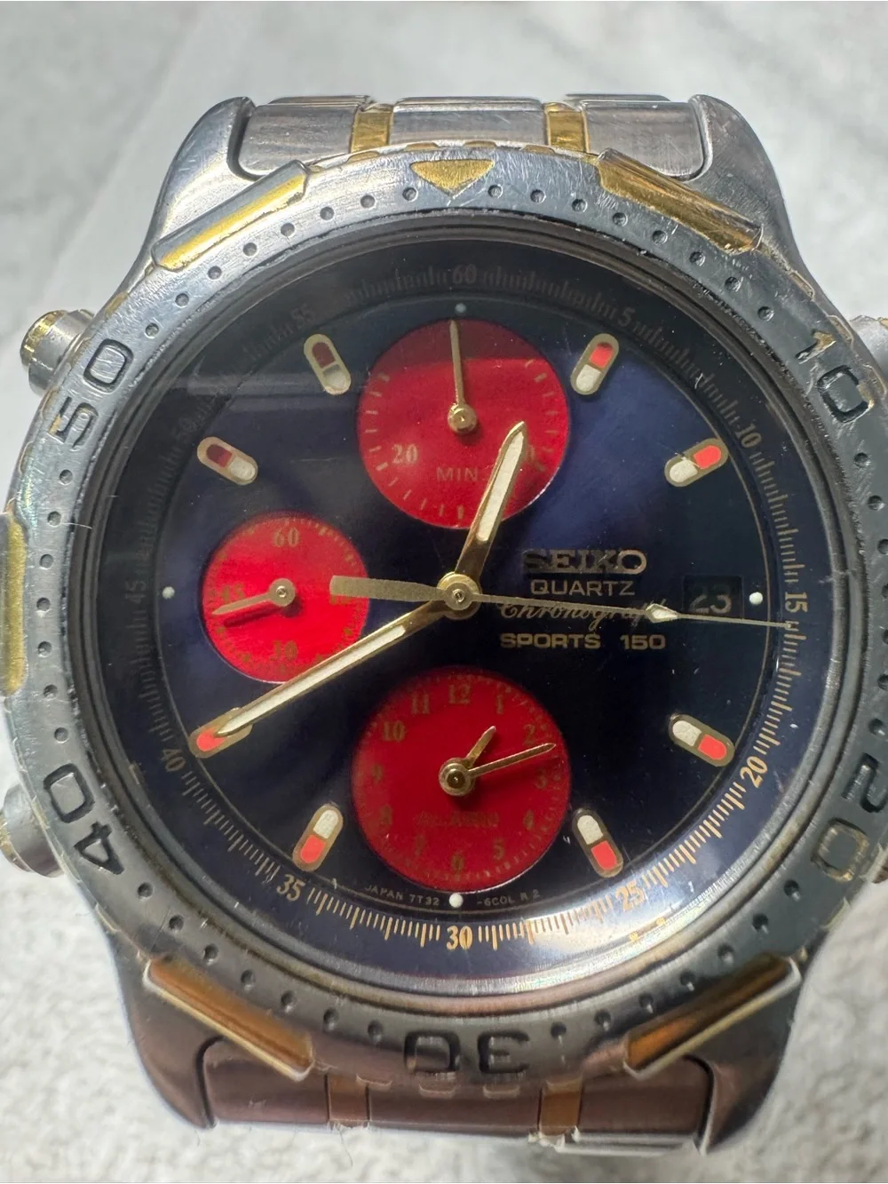 Seiko Navy Dial Chronograph with Red Subdials and Gold Accents